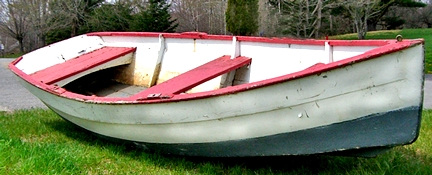 Water-worthy wood rowboat